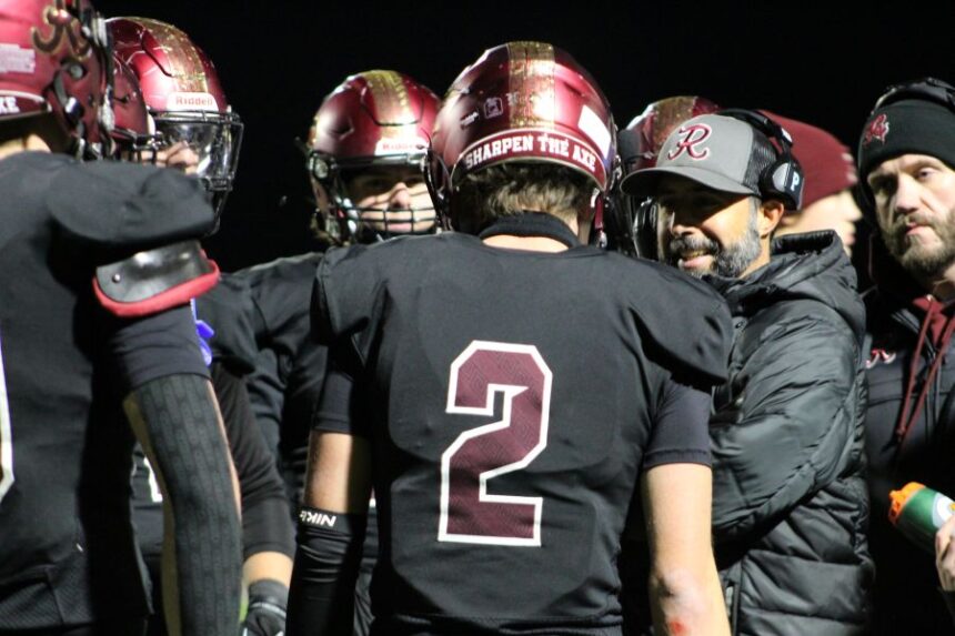 Rigby coach Armando Gonzalez talks to his team during a timeout in Friday's game against Rocky Mountain. | Allan Steele, EastIdahoSports.com.
