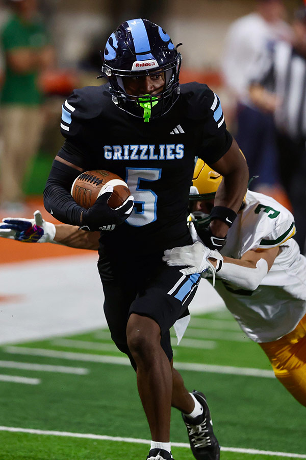 Skyline Zyan Crockett breaks a 50-yard TD run