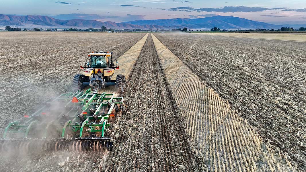 Tractor in a field at Hurst Brand Farms. | Courtesy Brandon Hurst