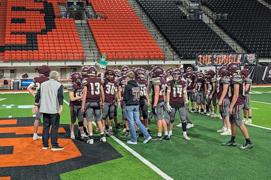 West Side accepts third-place trophy
