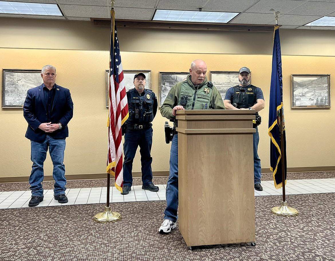 Shoshone County Sheriff William Eddy addresses reporters during a press conference on Friday night at the Wallace Inn. He was joined by, from left to right, Kootenai County Sheriff Bob Norris, Kellogg Police Chief Paul Twidt, Osburn Police Chief Jason Woody (standing behind Eddy), and Pinehurst Police Chief John Richter.