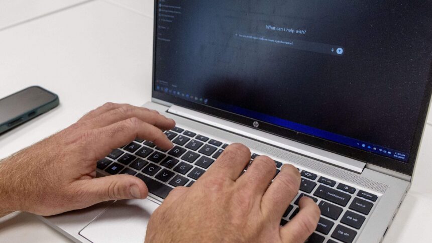 Kyle Patterson, director of organizational effectiveness for the City of Boise, demonstrates AI technology. | Darin Oswald, Idaho Statesman