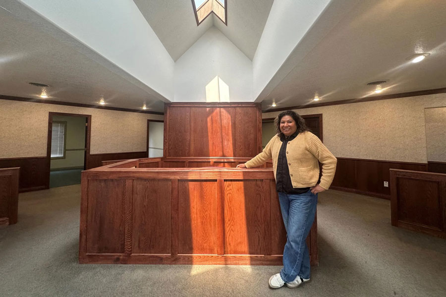 Frances Goli, broadband project manager for the Shoshone-Bannock Tribes, stands in a former radio station near Blackfoot, Idaho. The building is being converted into a data hub and offices for the tribes’ high-speed internet operations. | Sarah Jane Tribble, KFF Health News