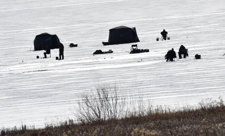 A group of fishermen fishing near Staley Springs.