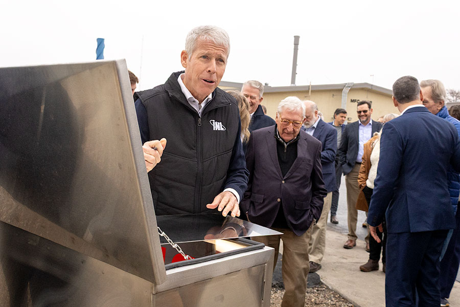 U.S. Department of Energy Secretary Chris Wright signing part of a sign notifiying that an experimental reactor is on. | Daniel V. Ramirez, EastIdahoNews.com