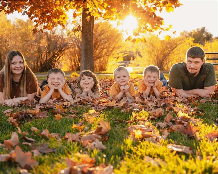 Nicole and Patrick Marks with their four kids. | Courtesy photo
