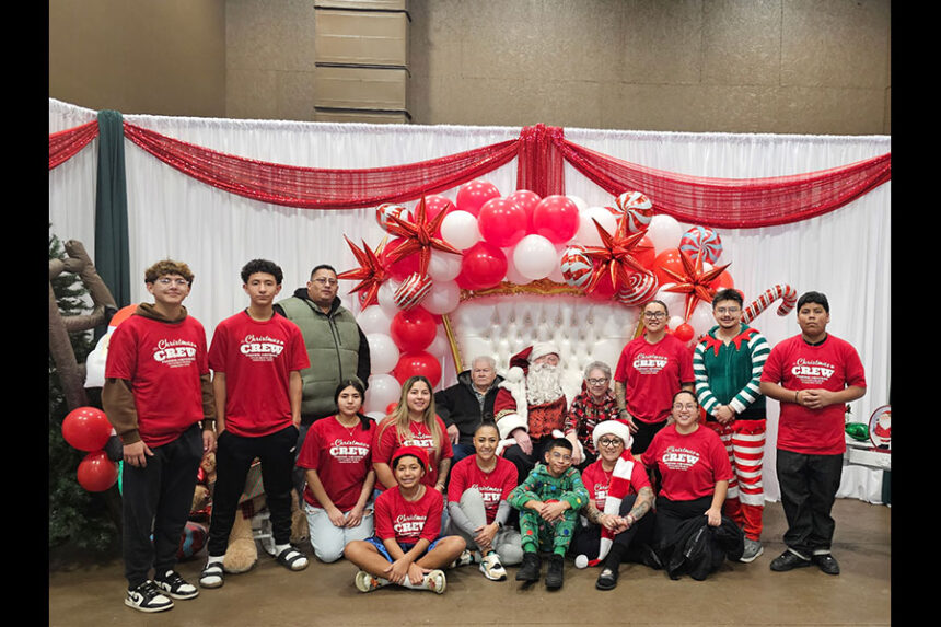 Liliana Sanchez with her family and members of the community during Pancakes with Santa event. | Courtesy Lilliana Sanchez