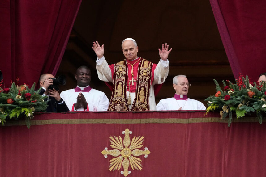 Pope Leo XIV waves after delivering the Urbi et Orbi (Latin for 'to the city and to the world' ) Christmas' day blessing from the main balcony of St. Peter's Basilica at the Vatican, Thursday, Dec. 25, 2025. | Gregorio Borgia, Associated Press