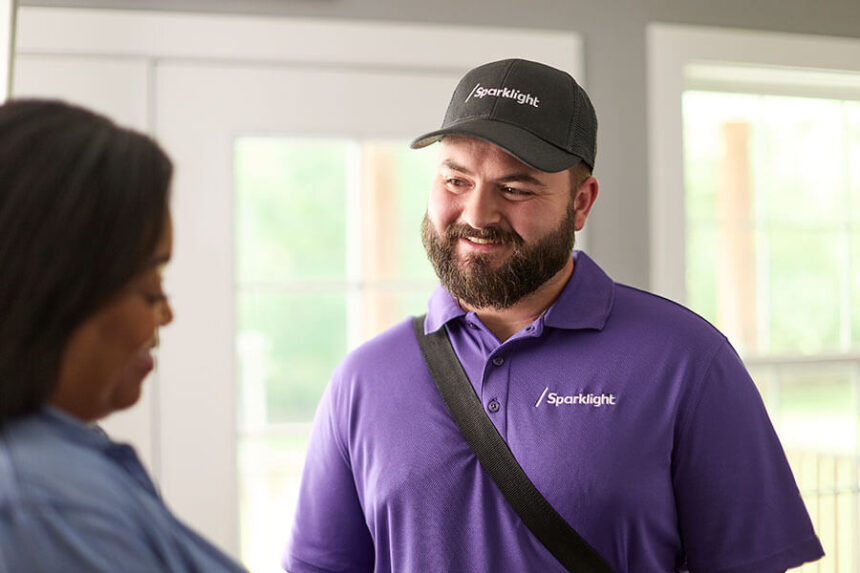 Sparklight worker with customer