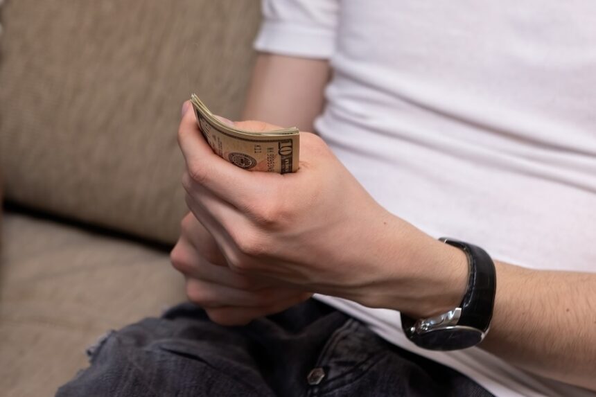 a man and a woman consider the family budget a 2024 12 02 21 08 03 utc