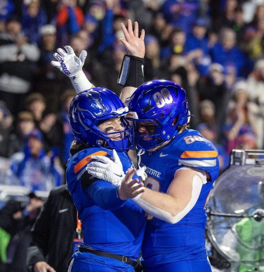 Boise State quarterback Maddux Madsen, left, celebrates with tight end Matt Wagner in the first quarter after Madsen ran for a touchdown. Sarah A. Miller smiller@idahostatesman.com