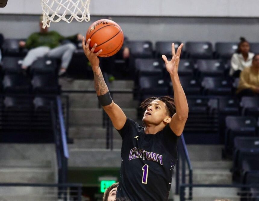 Century's Justus Mangum drives to the basketball during Saturday's game against Shelley. Shelley's Landen Smith led the Russets in scoring in Saturday's win over Century. | Kyle Riley, EastIdahoSports.com.