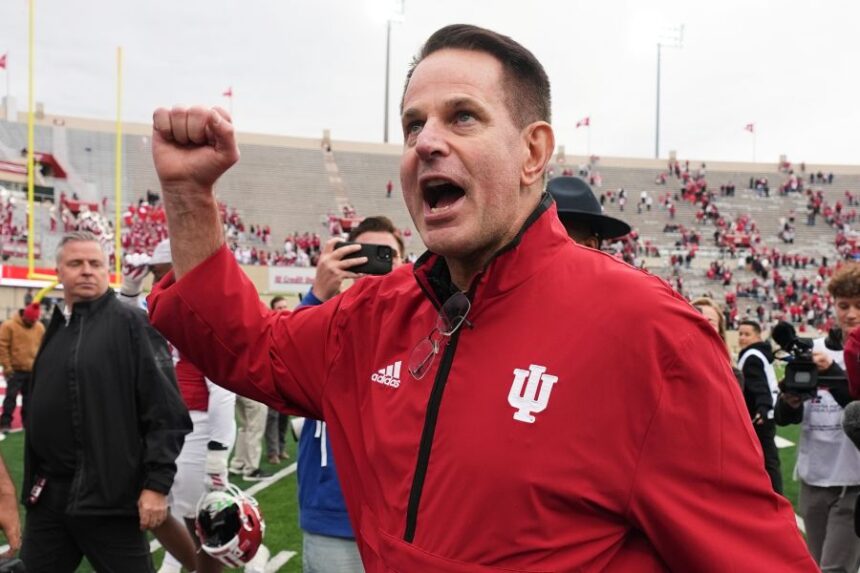 FILE - Indiana head coach Curt Cignetti shouts to the fans as he leaves the field following an NCAA college football game against UCLA, Saturday, Oct. 25, 2025, in Bloomington, Ind. (AP Photo/Darron Cummings, File)