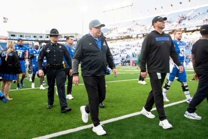 Kentucky head coach Mark Stoops walks off the field after defeating Tennessee Tech during an NCCA college football game in Lexington, Ky., Saturday, Nov. 15, 2025. (AP Photo/Tanner Pearson)