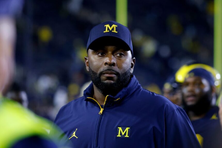 FILE - Michigan coach Sherrone Moore walks off the field following an NCAA football game on Saturday, Aug. 30, 2025, in Ann Arbor, Mich. (AP Photo/Al Goldis, File)