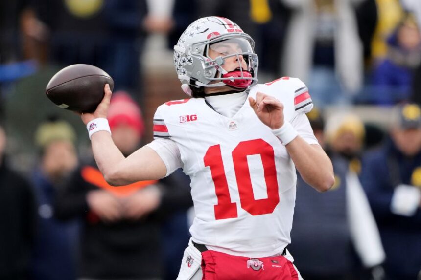 Ohio State quarterback Julian Sayin throws during the first half of an NCAA college football game against Michigan, Saturday, Nov. 29, 2025, in Ann Arbor, Mich. (AP Photo/Ryan Sun)