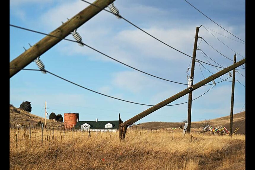 Power poles along U.S. Highway 93 near Golden, Colorado, are snapped in half during a strong windstorm on Wednesday. Outages are lingering in Colorado as a new windstorm hits. Mandatory Credit: RJ Sangosti/MediaNews Group/The Denver Post/Getty Images via CNN Newsource
