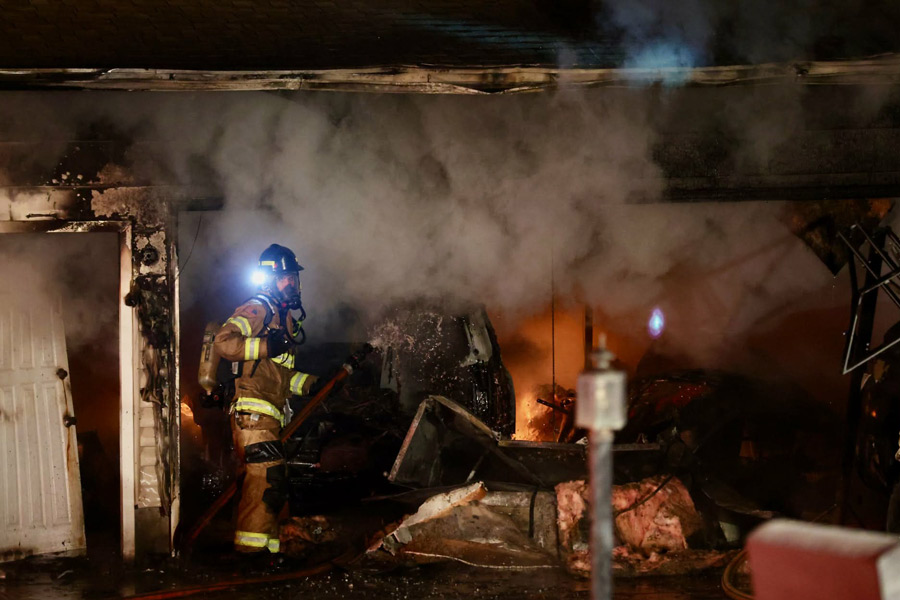 The house fire, which caused a total loss to the garage. | Kyle Riley, EastIdahoNews.com