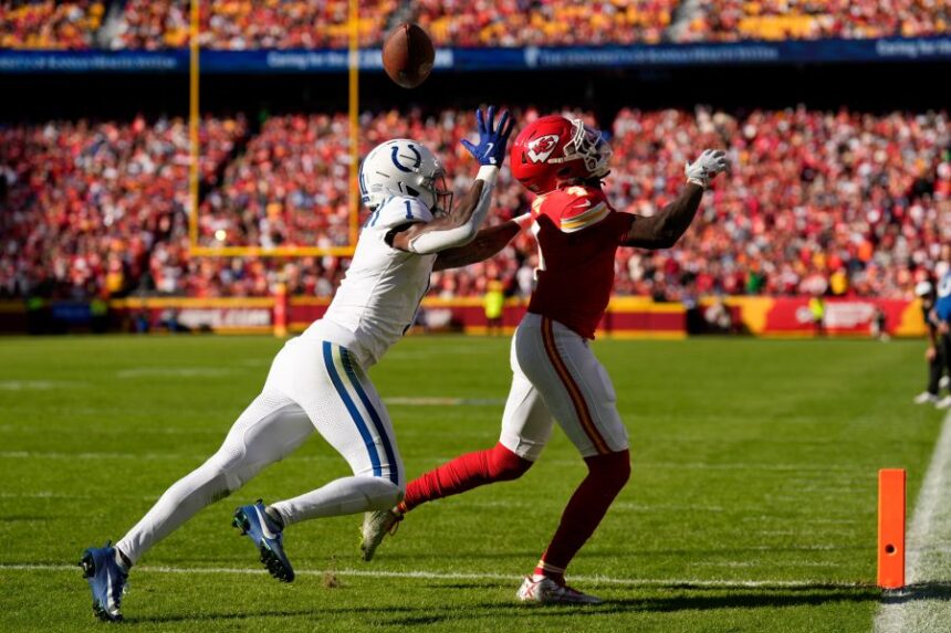 Indianapolis Colts cornerback Sauce Gardner (1) breaks up a pass to Kansas City Chiefs wide receiver Rashee Rice (4) during the first half of an NFL football game Sunday, Nov. 23, 2025, in Kansas City, Mo. (AP Photo/Charlie Riedel)