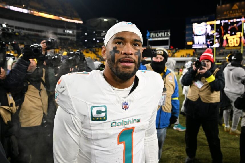 Miami Dolphins quarterback Tua Tagovailoa (1) walks off the field after an NFL football game against the Pittsburgh Steelers in Pittsburgh, Monday, Dec. 15, 2025. (AP Photo/Justin Berl)