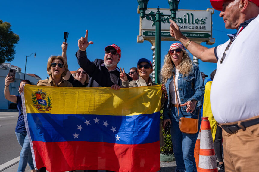 People celebrate outside Versailles Cuban Cuisine after President Donald Trump announced Venezuelan President Nicolás Maduro had been captured and flown out of the country, in Miami, Saturday, Jan. 3, 2026. | Jen Golbeck, Associated Press
