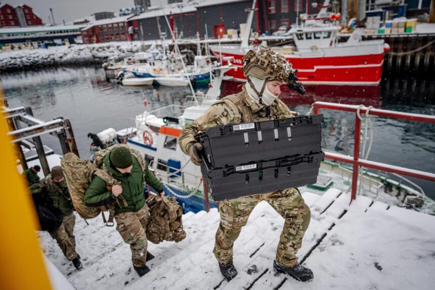 Danish soldiers disembark at the harbor in Nuuk, Greenland, on Sunday, Jan. 18, 2026. | Mads Claus Rasmussen, Associated Press