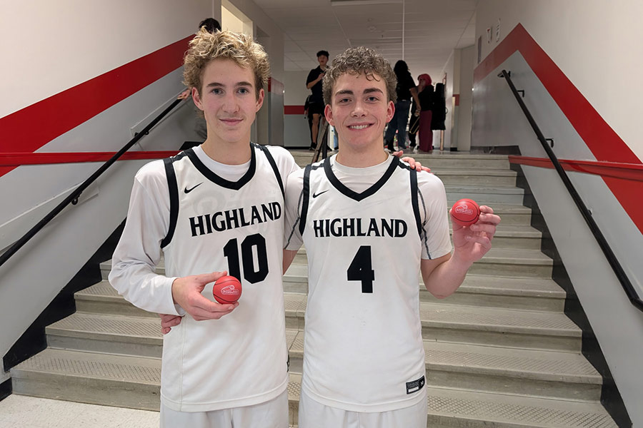 Highland Kasey Carter (left) and Boston McCulloch