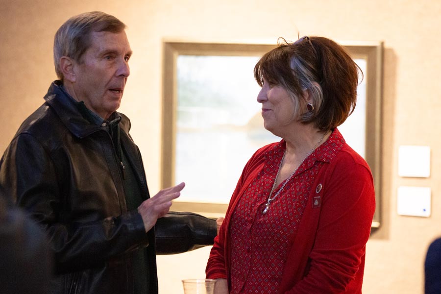 Idaho Falls’ outgoing mayor, Rebecca Casper, hugs a community member as others line up to talk to her Wednesday. | Cody Roberts, EastIdahoNews.com
