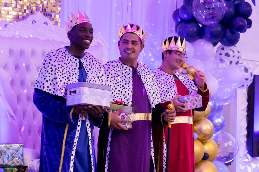 Tapelo Dune (left), Abraham Galicia (middle) and Diego Jara (Right) volunteering to dress up as the Three Wise Kings to give gifts to children at the event Monday. | Daniel V. Ramirez, EastIdahoNews.com