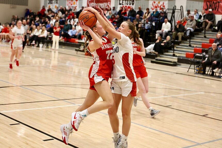 Highland Lexi Vawdrey blocks Madison Camri Call