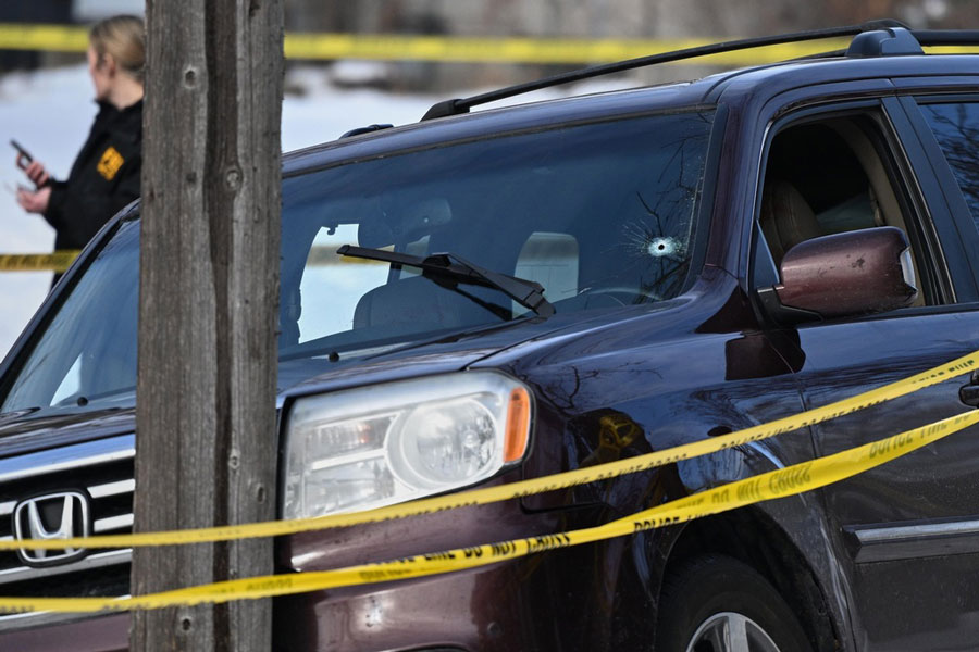 A bullet hole is seen in the windshield as law enforcement officers work at the scene of a shooting involving federal law enforcement agents, Wednesday, Jan. 7, 2026, in Minneapolis. | Tom Baker, Associated Press