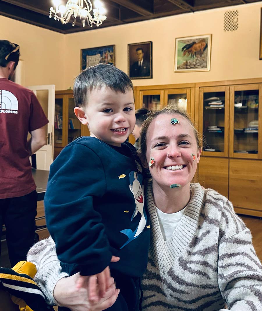 Jacob, the youngest of the children, asleep at the Children's Center with a family member. | Courtesy of Jill Seymour