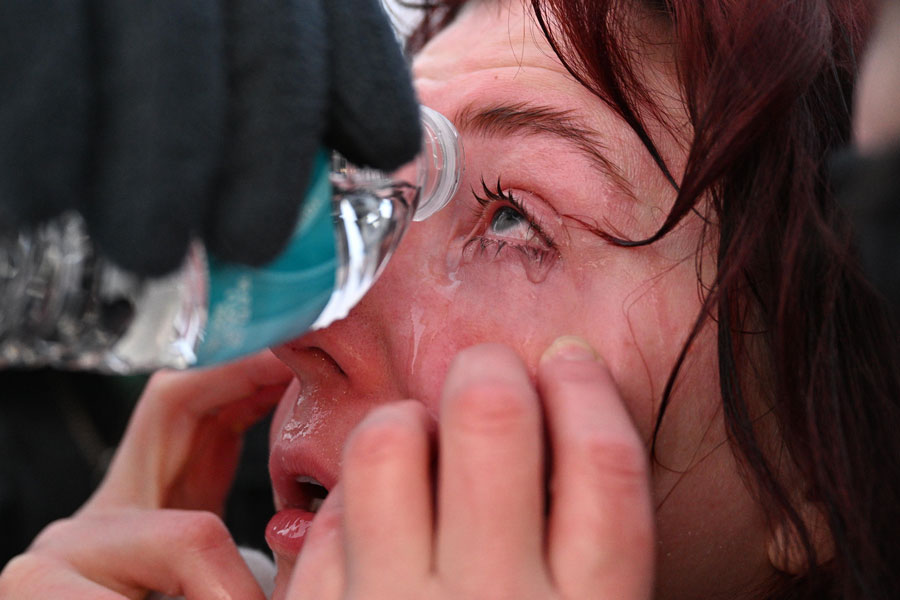 A protester receives aid after confronting law enforcement outside the Bishop Henry Whipple Federal Building, Thursday, Jan. 8, 2026, in Minneapolis, Minn. | Tom Baker, Associated Press