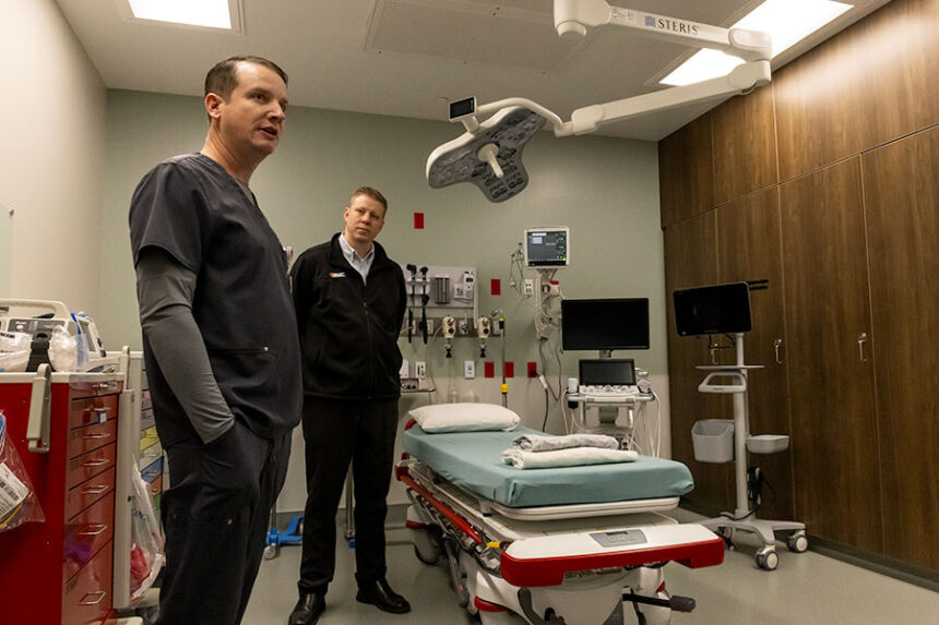 (Front) Dr. Brandon Bloxham and Dr. Bracken Williams inside one of the trauma rooms at Eastern Idaho Regional Medical Center's new North Idaho Falls ER. | Daniel V. Ramirez, EastIdahoNews.com