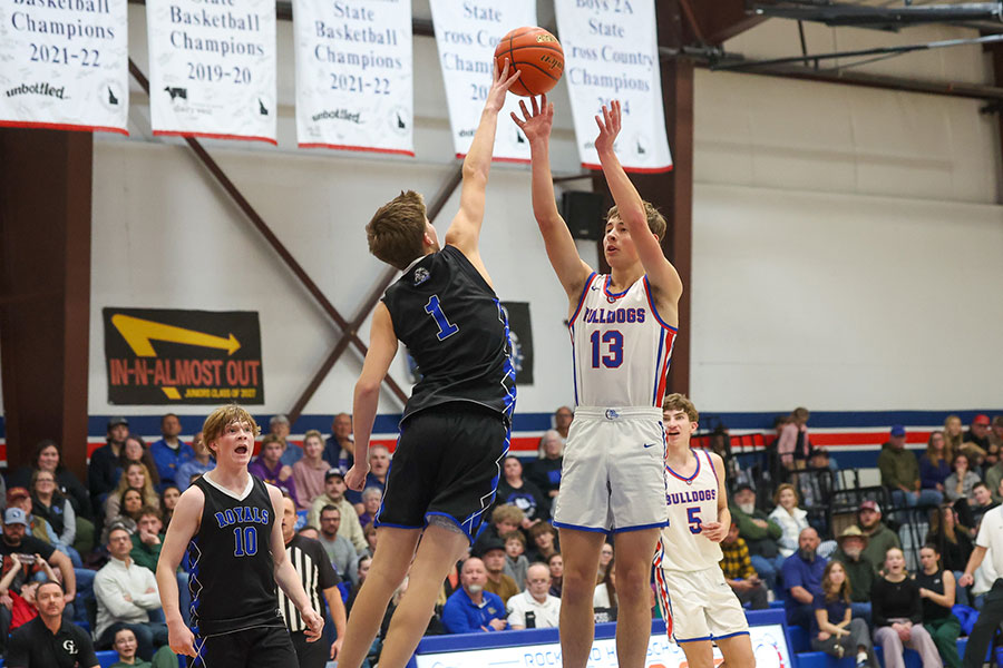 Rockland Iver Hendrickson blocked by Grace Lutheran Jaxon Miller