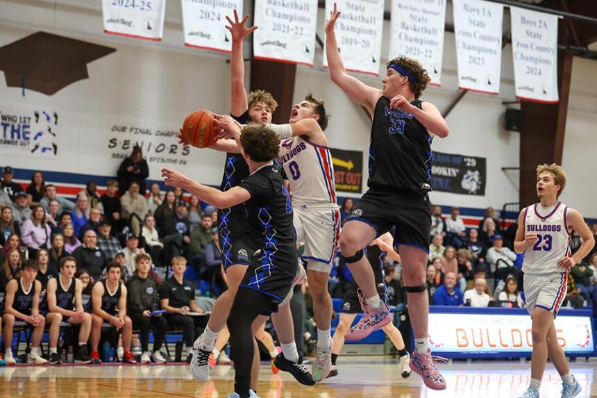 Rockland Zach Permann challenges the entire Grace Lutheran defense