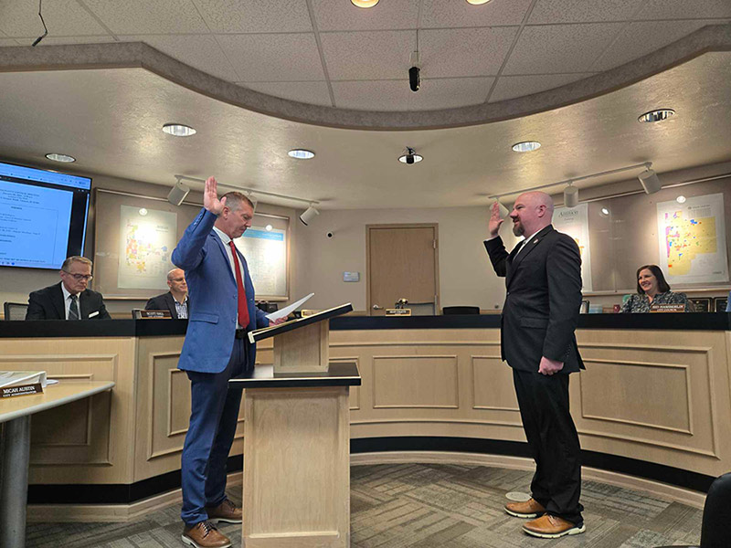 Ammon City Councilman Nolan Wheeler being sworn in by new Ammon Mayor, Brian Powell. | City of Ammon