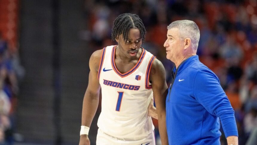 Boise State coach Leon Rice talks with Aginaldo Neto in the second half of their game against New Mexico at ExtraMile Arena on Tuesday. Neto scored 10 points to help the Broncos rally. Sarah A. Miller, Idaho Statesman.