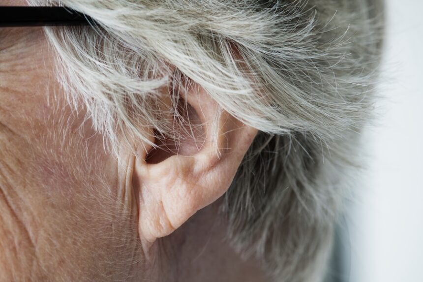 Closeup of elderly woman's ear