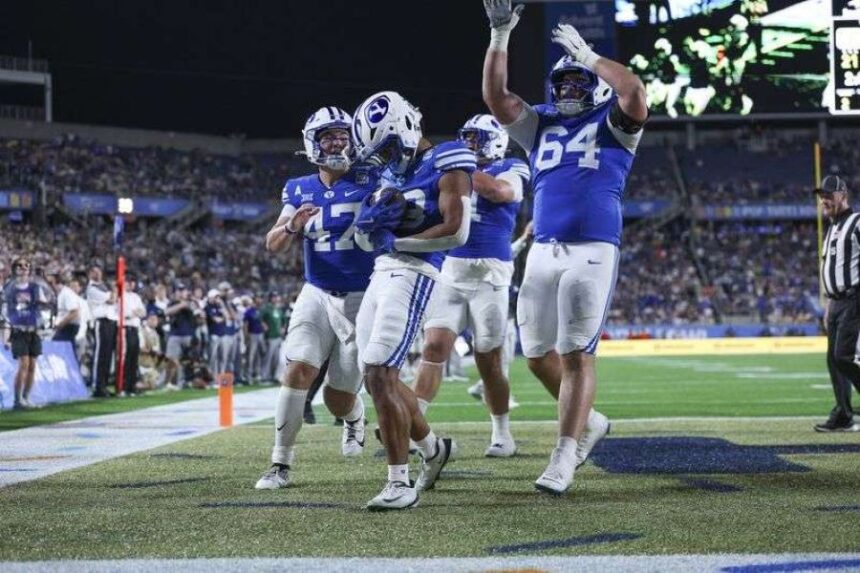 BYU Cougars running back Jovesa Damuni (28) reacts after scoring a touchdown against the Georgia Tech Yellow Jackets in the fourth quarter during the Pop-Tarts Bowl at Camping World Stadium, Saturday, Dec. 27, 2025 in Orlando, Florida. (Photo: Nathan Ray Seebeck, Imagn Images via USA TODAY Sports)