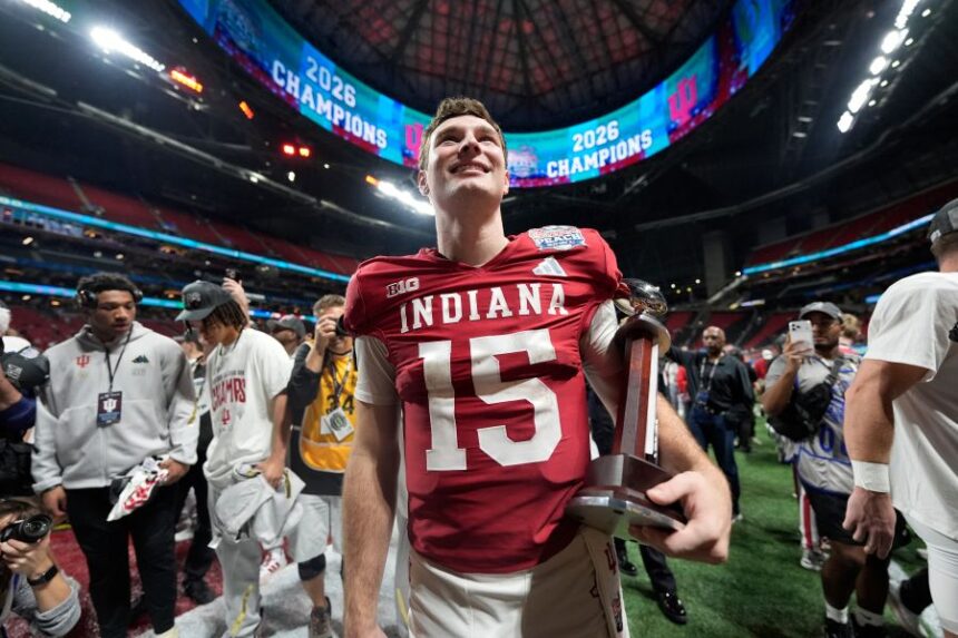 Indiana quarterback Fernando Mendoza (15) celebrates after the Peach Bowl NCAA college football playoff semifinal against Oregon, Friday, Jan. 9, 2026, in Atlanta. (AP Photo/Brynn Anderson)