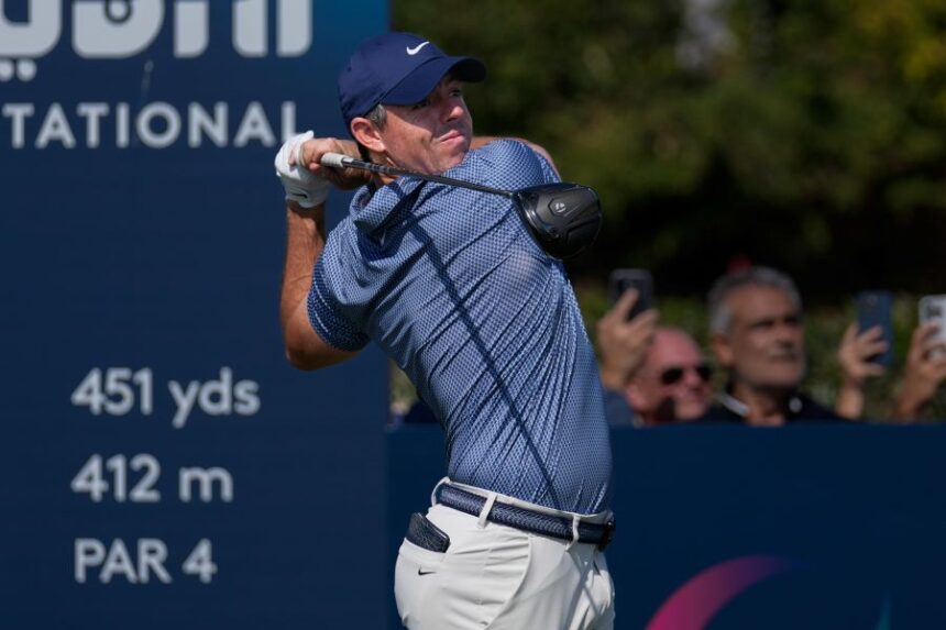 Rory McIlroy of Northern Ireland hits off the first tee during the final round of Dubai Invitational golf tournament in Dubai, United Arab Emirates, Sunday, Jan. 18, 2026. (AP Photo/Altaf Qadri)