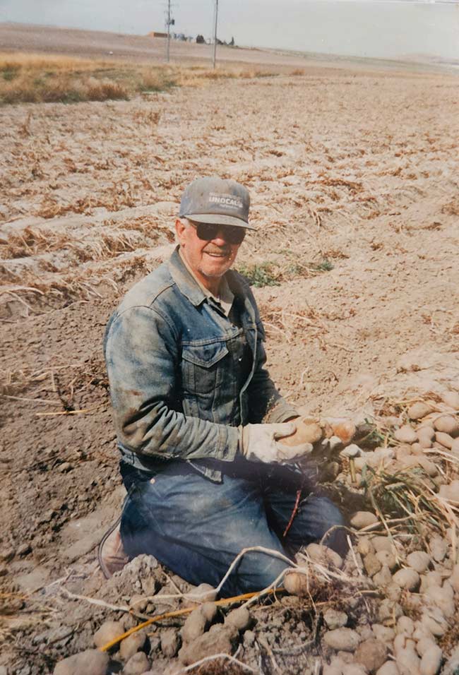 Reed Hansen on the farm in a field of potatoes | Courtesy Nathan Hansen