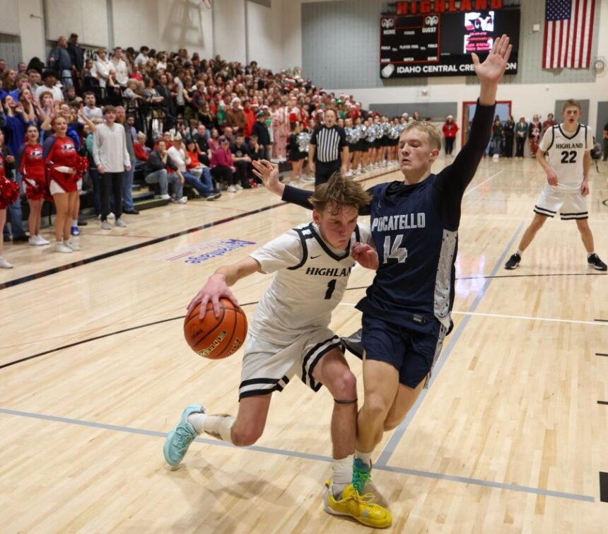 Highland's Marshall Glenn drives around Pocatello defender Ryker May during a game earlier this season. | Kyle Riley, EastIdahoSports.com.