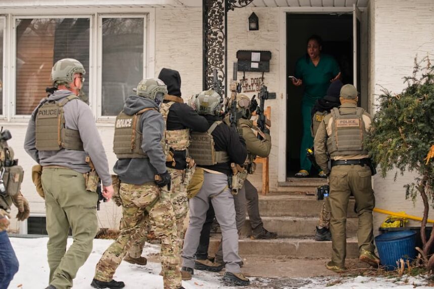 ICE breaks down door