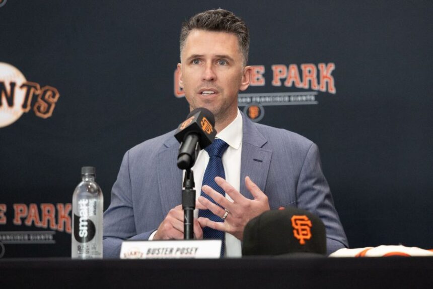 FILE -San Francisco Giants President of Baseball Operations Buster Posey sits during a press conference introducing Tony Vitello as the new manager of the San Francisco Giants baseball team on Oct. 30, 2025, in San Francisco. (AP Photo/Benjamin Fanjoy, File)
