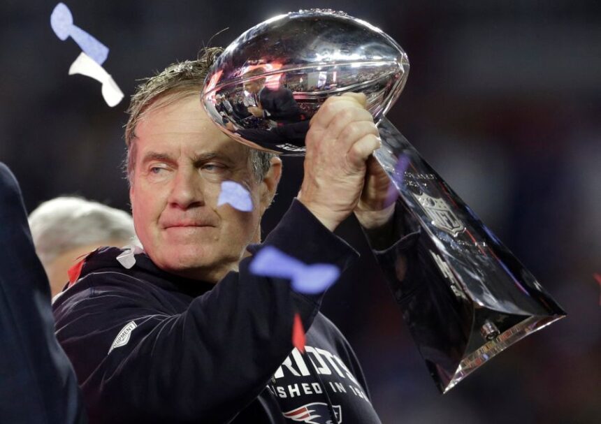FILE - New England Patriots head coach Bill Belichick holds up the Vince Lombardi Trophy as he celebrates the Patriots' victory over the Seattle Seahawks in NFL Super Bowl XLIX football game Feb. 1, 2015, in Glendale, Ariz. (AP Photo/Patrick Semansky, File)