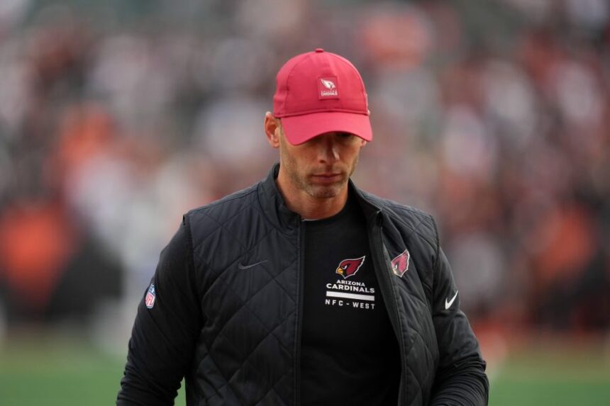 Arizona Cardinals head coach Jonathan Gannon leaves the field after an NFL football game against the Cincinnati Bengals, Sunday, Dec. 28, 2025, in Cincinnati. (AP Photo/Joshua A. Bickel)
