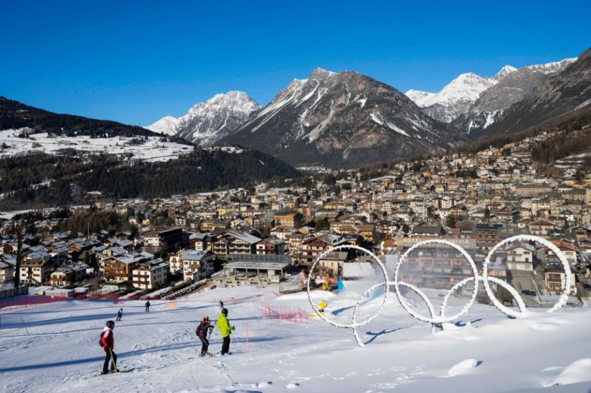 FILE - Olympic rings are displayed near a slope of the Stelvio Ski Center, venue for the alpine ski and ski mountaineering disciplines, at the 2026 Milan Cortina Winter Olympics, in Bormio, Italy, Jan. 16, 2025. (AP Photo/Luca Bruno, File)