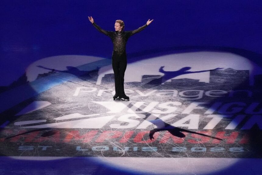 Gold medalist Ilia Malinin arrives for the metal ceremony after the men's free skate competition at the U.S. Figure Skating Championships, Saturday, Jan. 10, 2026, in St. Louis. (AP Photo/Jeff Roberson)